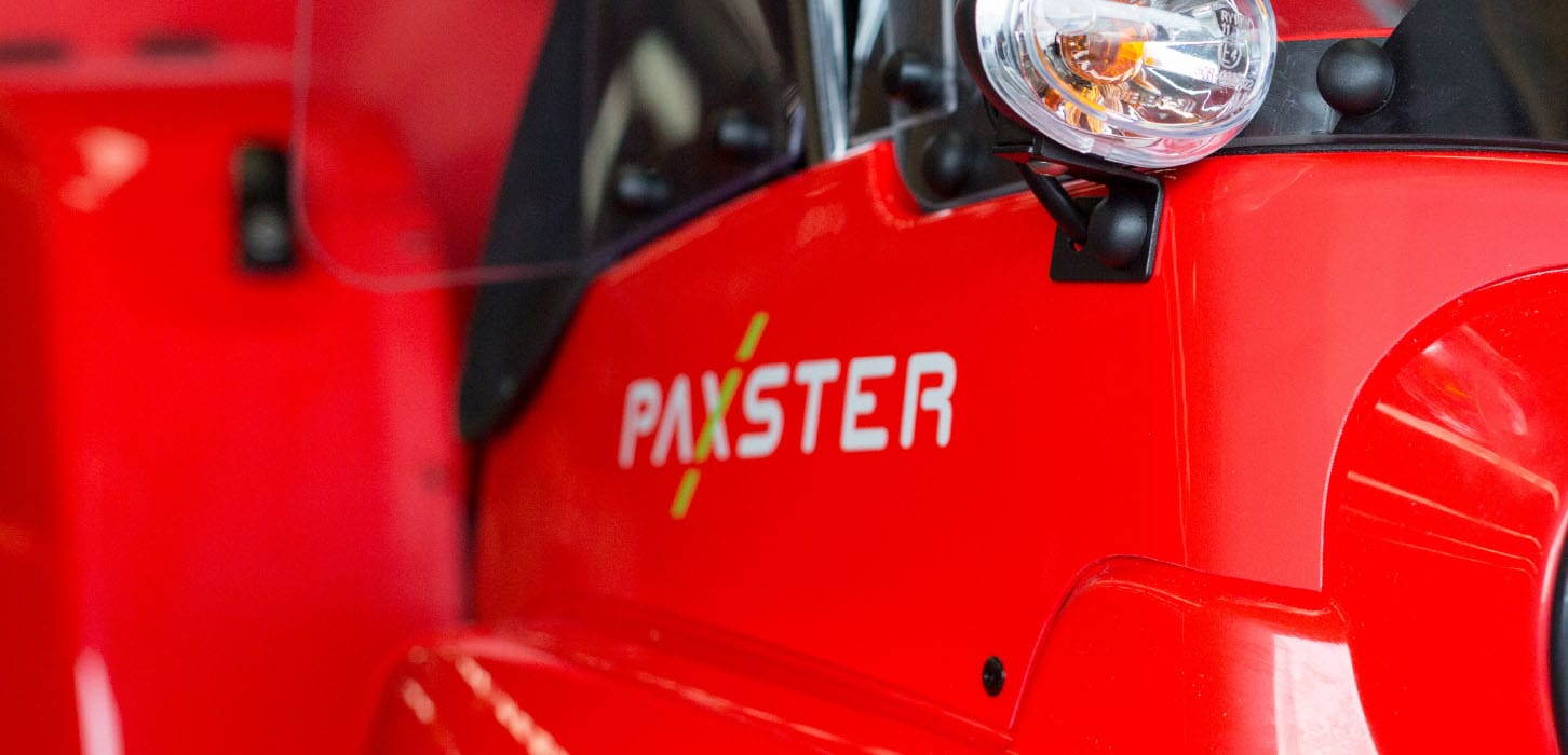 The paxster logo on a buggy